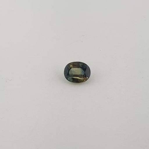 1.10ct Oval Greenish Sapphire 6.7x5.5mm - Dynagem 
